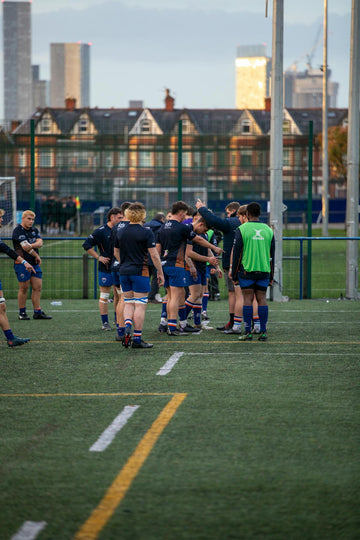 Rugby players in training wearing nasal strips for better breathing performance