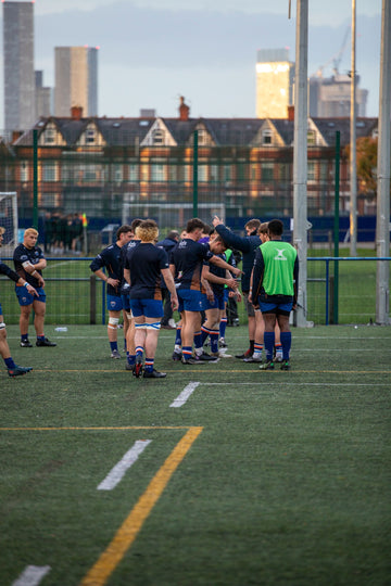Rugby players in training wearing nasal strips for better breathing performance